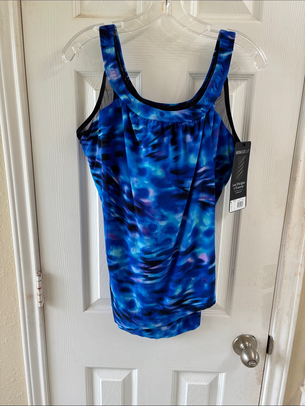 Miraclesuit Blue & Black womens swim top. . NWT